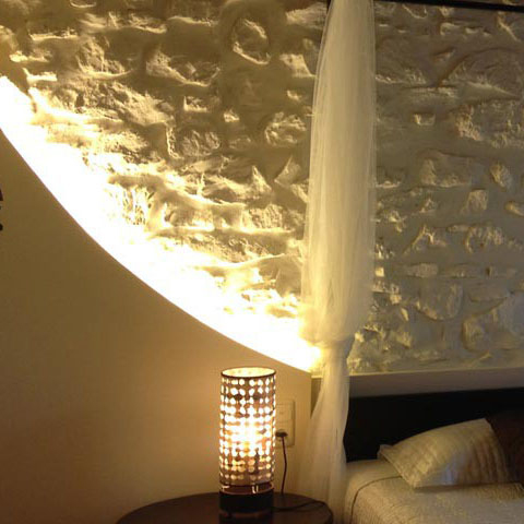 Interior de la habitación Ixotu en Bioalquería, alojamiento ecológico y confortable